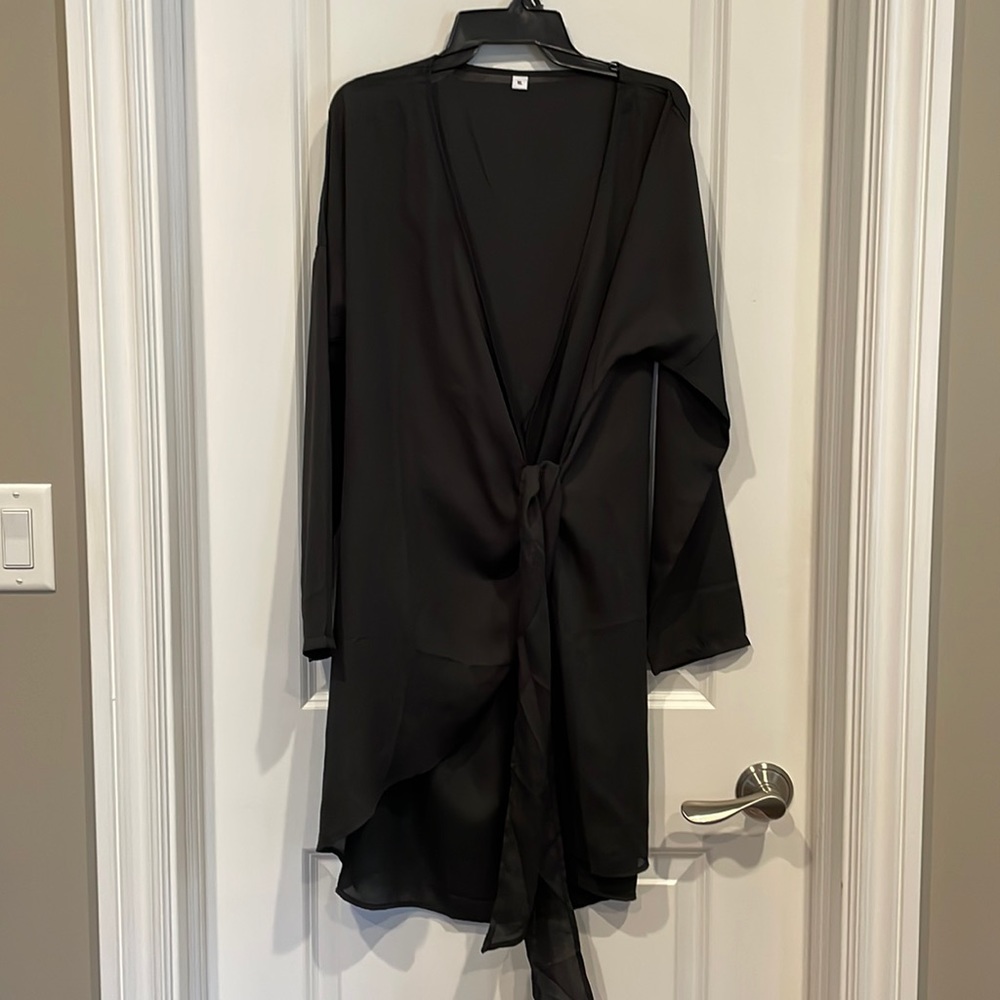 Ladies black cover up.